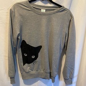 Black cat peering sweatshirt in EUC